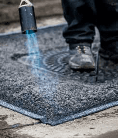 Sealing a pothole with Instaband Eco