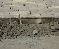 Cobbles laid on bedding concrete