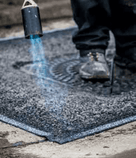 Sealing a pothole with Instaband Eco