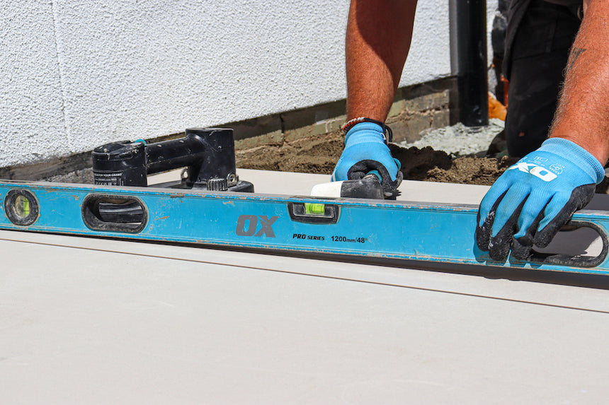 Levelling patio tile, primed with EasyPrime